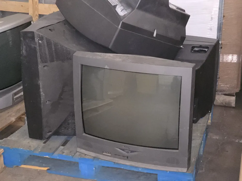 CRT TVs ready for processing at our recycling facility